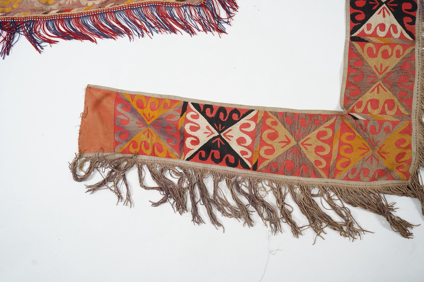 Five various sized late 19th / early 20th century Usbek Saye Gosha (V shaped) Suzani silk embroidered bridal yurt wall hangings, usually forming part of a dowry, two with later fringing, longest 172cm. Condition - some f